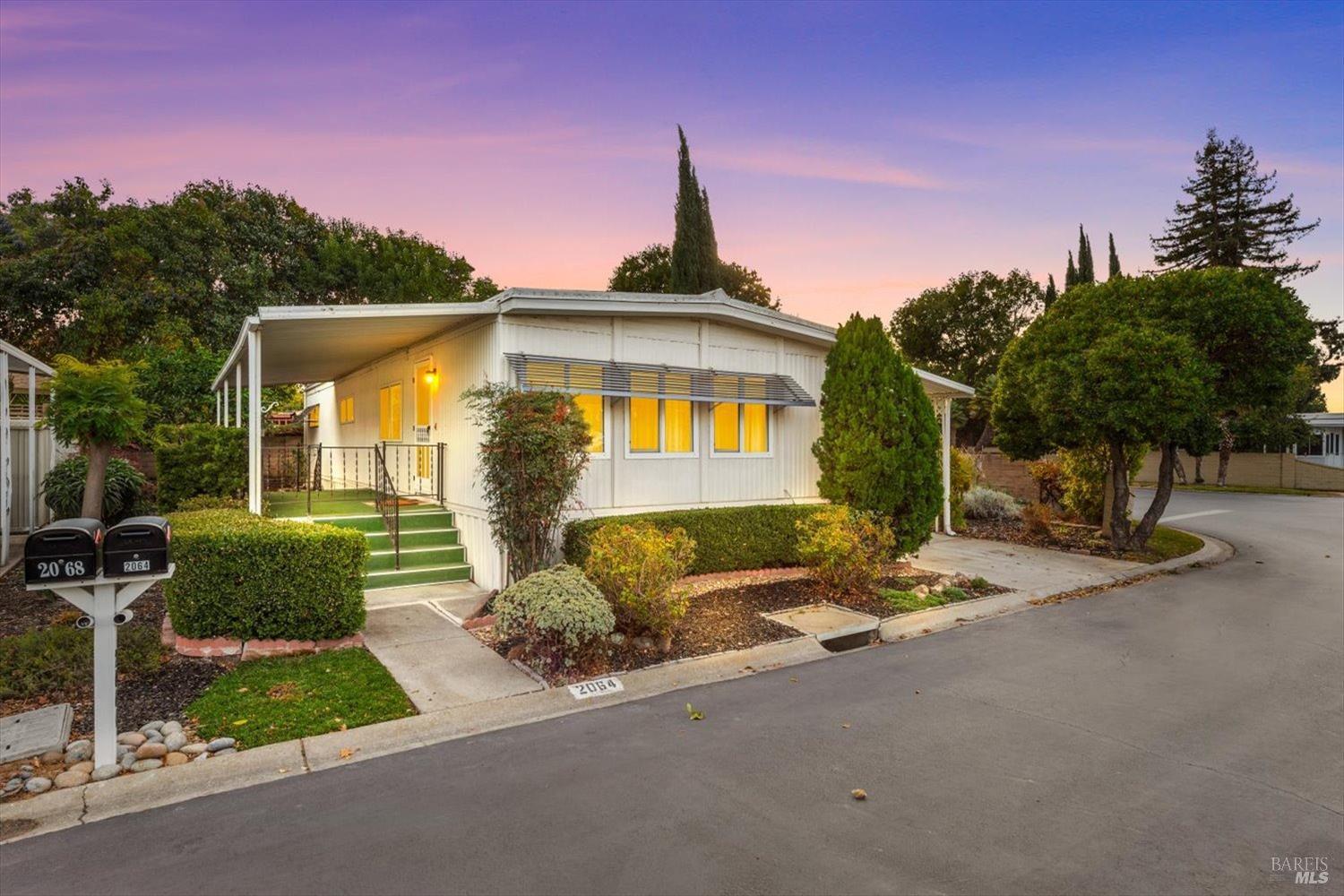 2064 Dalis Drive Concord, CA 94520 - Photo 1 of 1 a front view of a house with a yard and garage