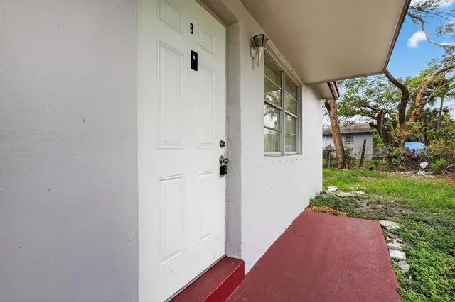 a view of a front door and porch