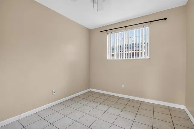 a view of an empty room with window