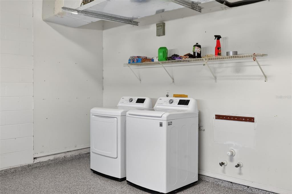 28244 Brokenmead Path Wesley Chapel, FL 33543 - Photo 29 of 37 a utility room with dryer and washer