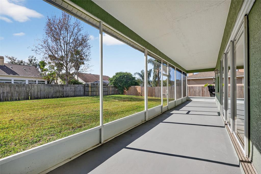 28244 Brokenmead Path Wesley Chapel, FL 33543 - Photo 31 of 37 a view of lake from a window