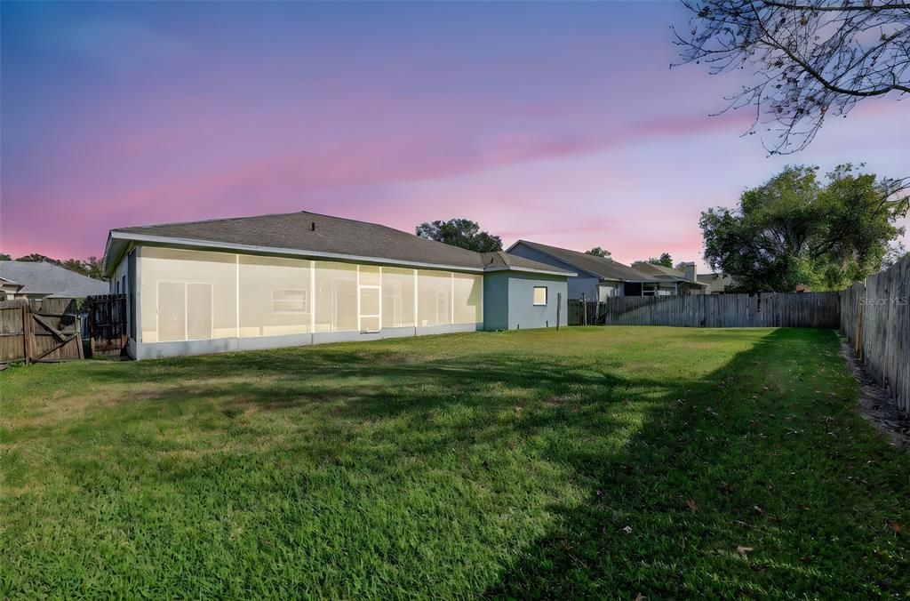 28244 Brokenmead Path Wesley Chapel, FL 33543 - Photo 35 of 37 a front view of a house with a yard