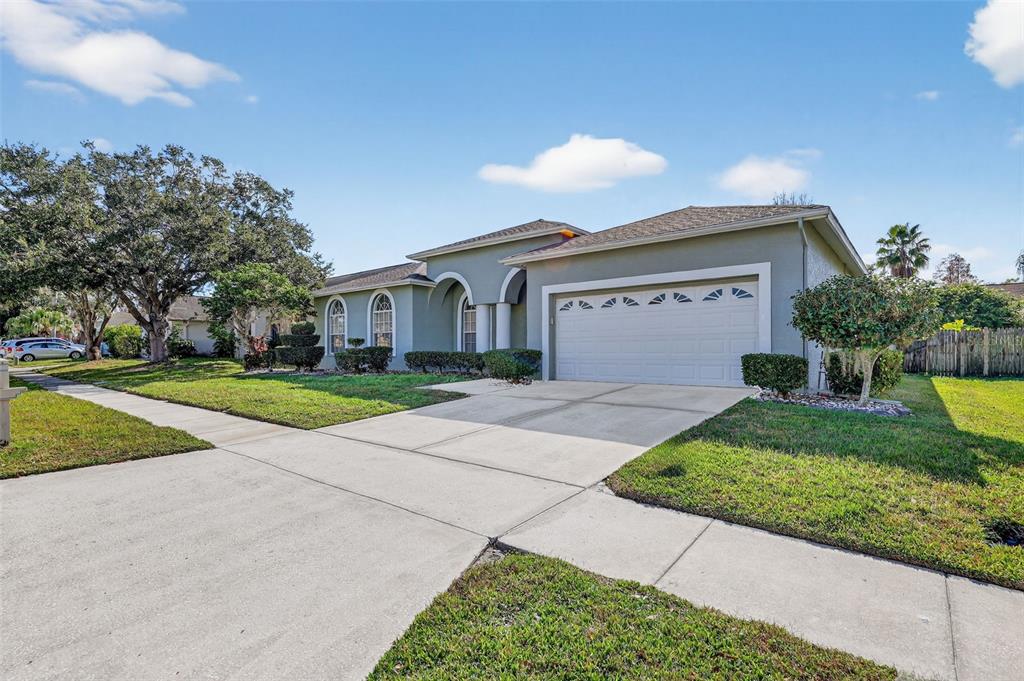 28244 Brokenmead Path Wesley Chapel, FL 33543 - Photo 4 of 37 a view of house with yard