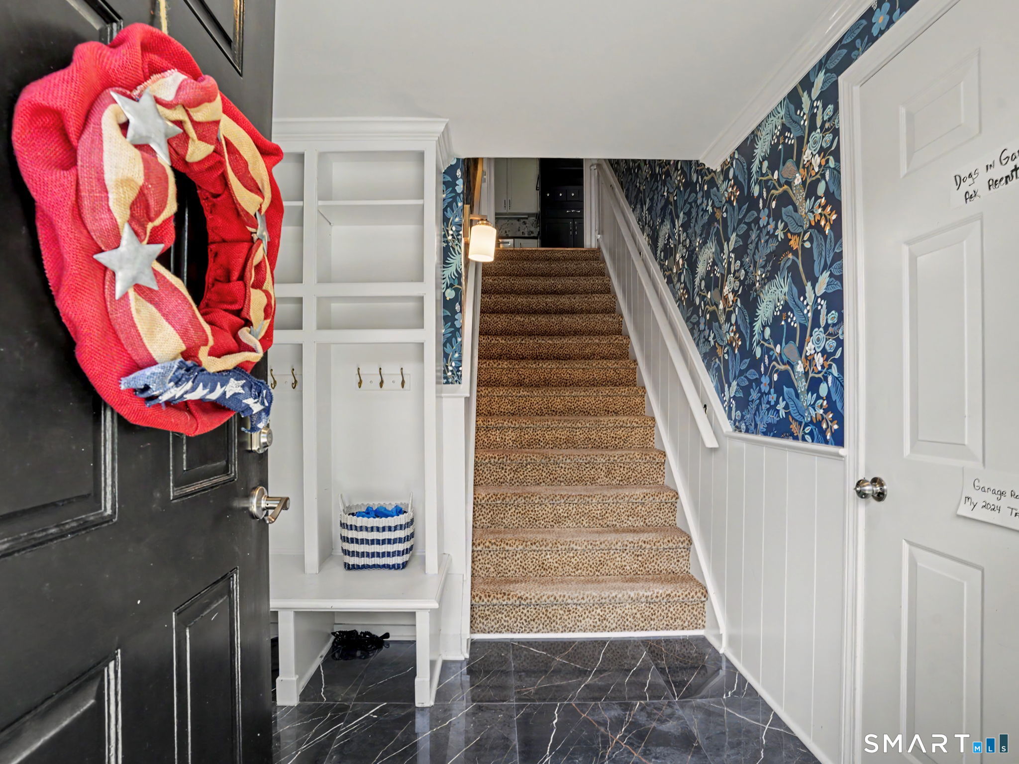 26 Abbott Avenue Ridgefield, CT 06877 - Photo 3 of 40 As soon as you enter you will be greeted with a stunning new tiled entry, designer wallpapered staircase with added wainscot leading to a newly remodeled kithcen.