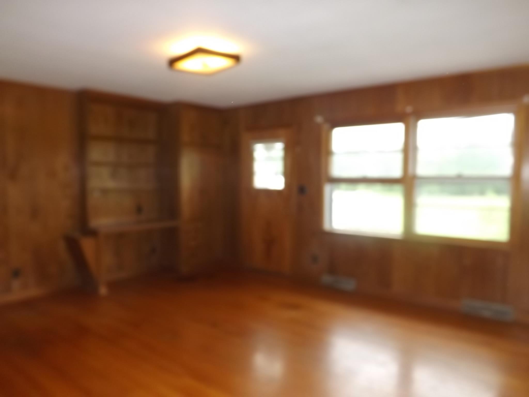5582 Shady Grove Road Morrison, TN 37357 - Photo 6 of 11 a view of an empty room with a window