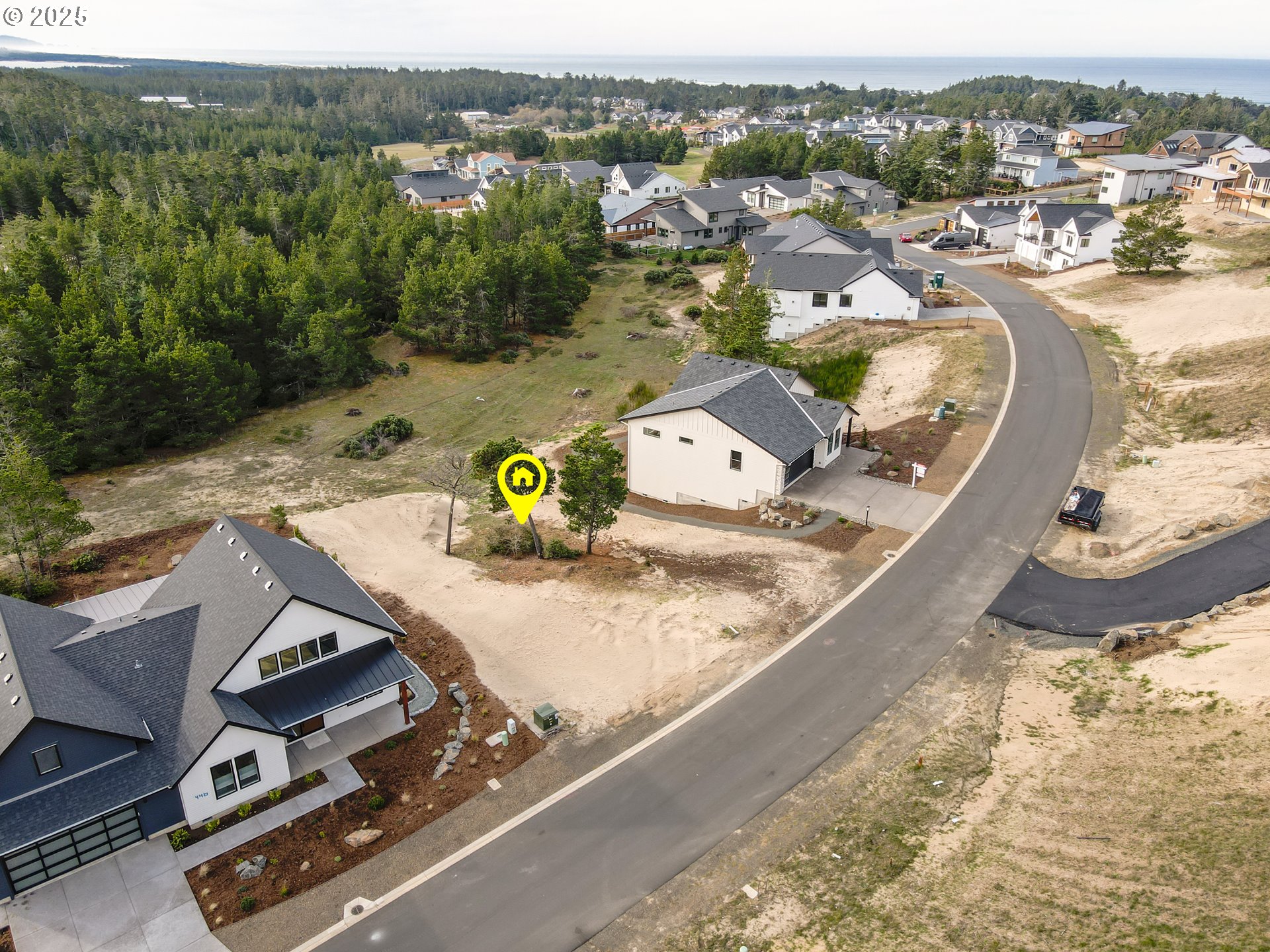 456 Meadows Drive, Unit 78 Nehalem, OR 97131 - Photo 14 of 21 an aerial view of a house with a yard