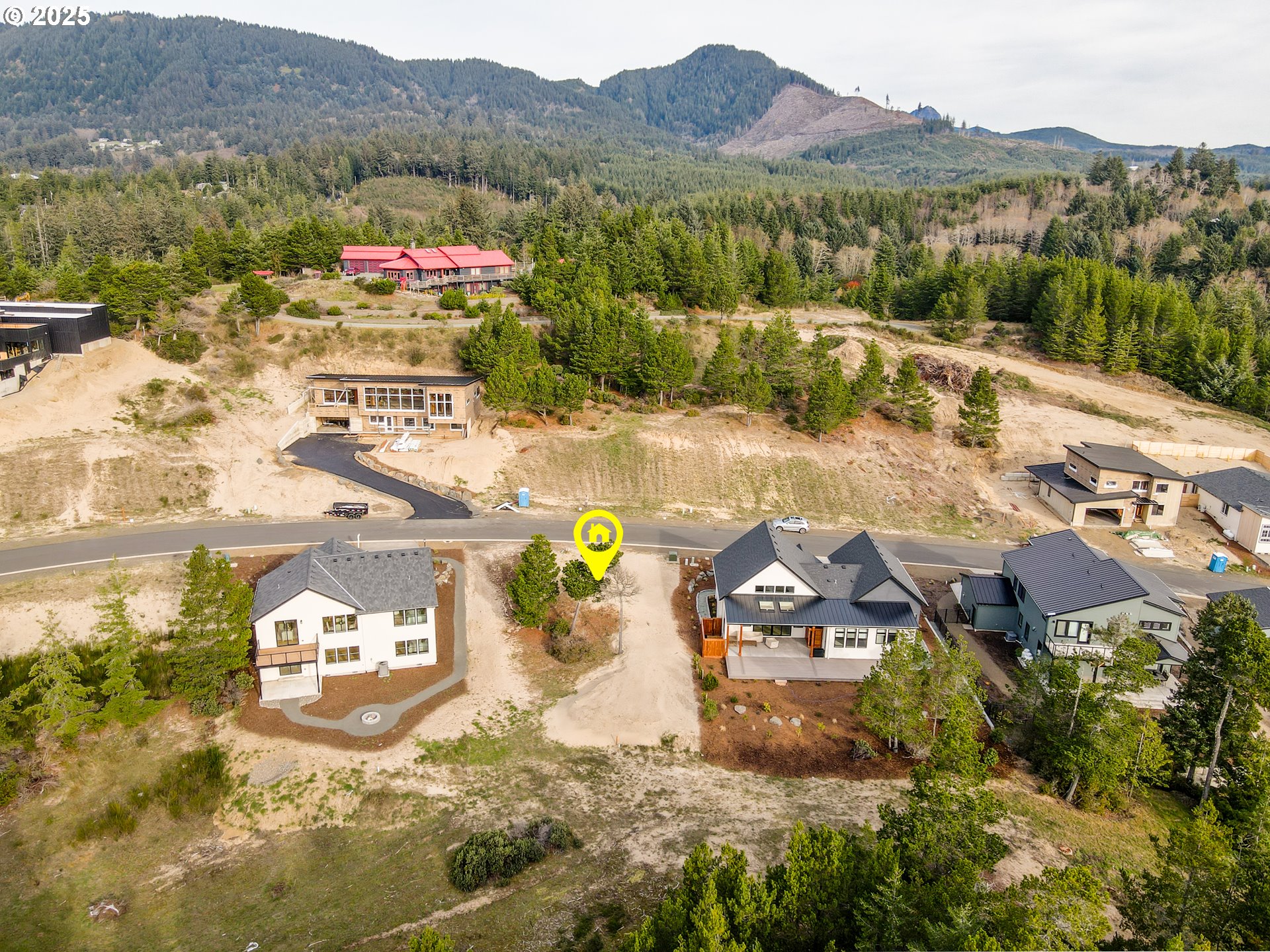 456 Meadows Drive, Unit 78 Nehalem, OR 97131 - Photo 20 of 21 a view of a city with a mountain