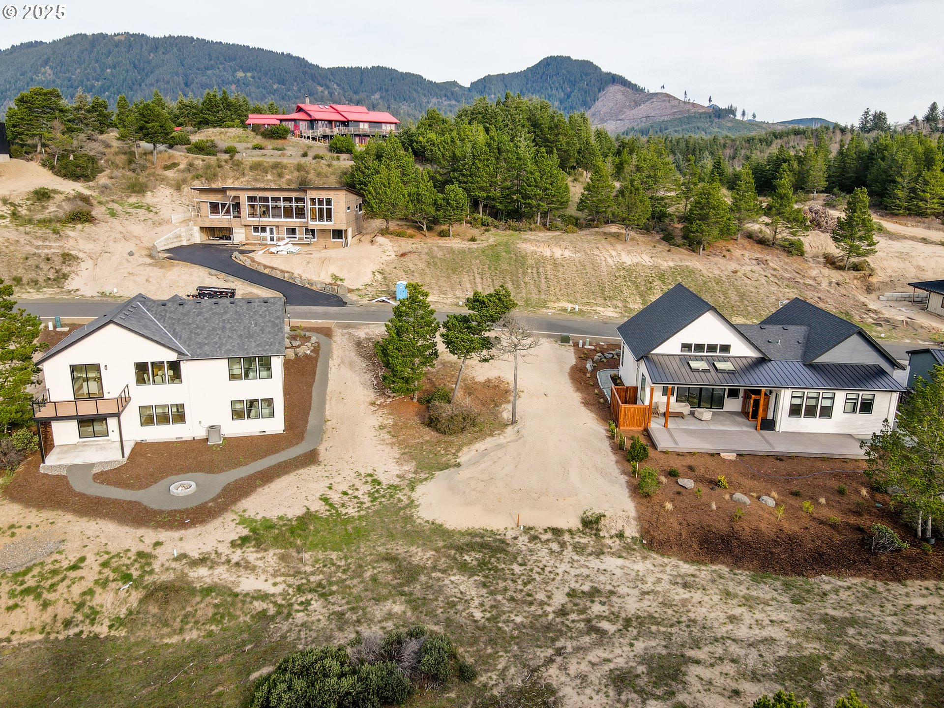 456 Meadows Drive, Unit 78 Nehalem, OR 97131 - Photo 8 of 21 an aerial view of a house with a mountain