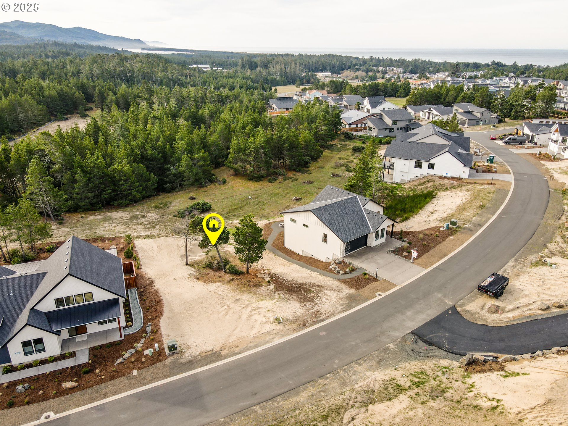 456 Meadows Drive, Unit 78 Nehalem, OR 97131 - Photo 9 of 21 an aerial view of residential houses with outdoor space