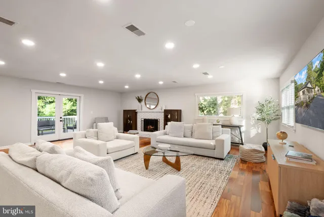 a kitchen with a sink a stove and a refrigerator