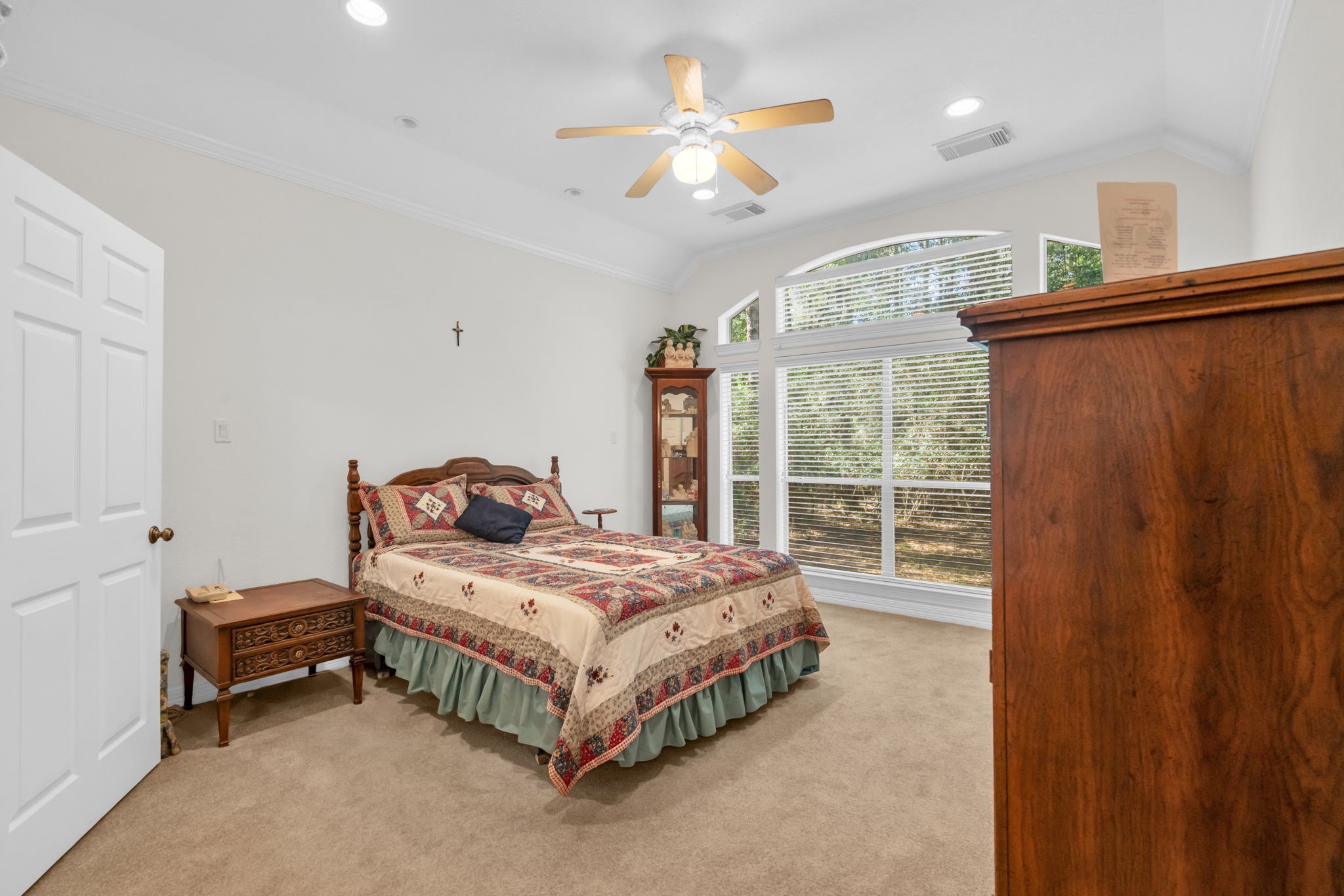 15501 Victoria's Way Montgomery, TX 77316 - Photo 17 of 36 Master bedroom with views to the backyard.