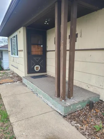 a view of a entryway front of a house