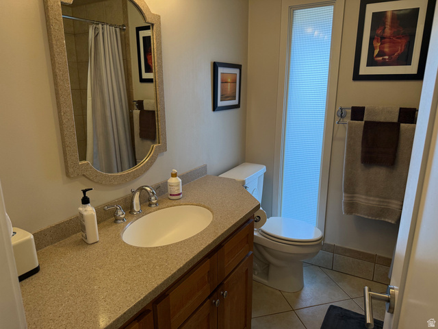 362 East 9150th Street South Sandy, UT 84070 - Photo 26 of 41 Bathroom with vanity, light tile patterned flooring, and curtained shower