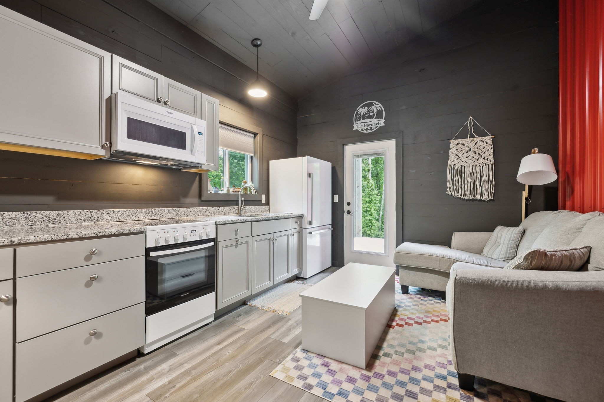 1785 St Johns Road Lascassas, TN 37085 - Photo 36 of 46 a kitchen with stainless steel appliances granite countertop a stove a sink and a refrigerator