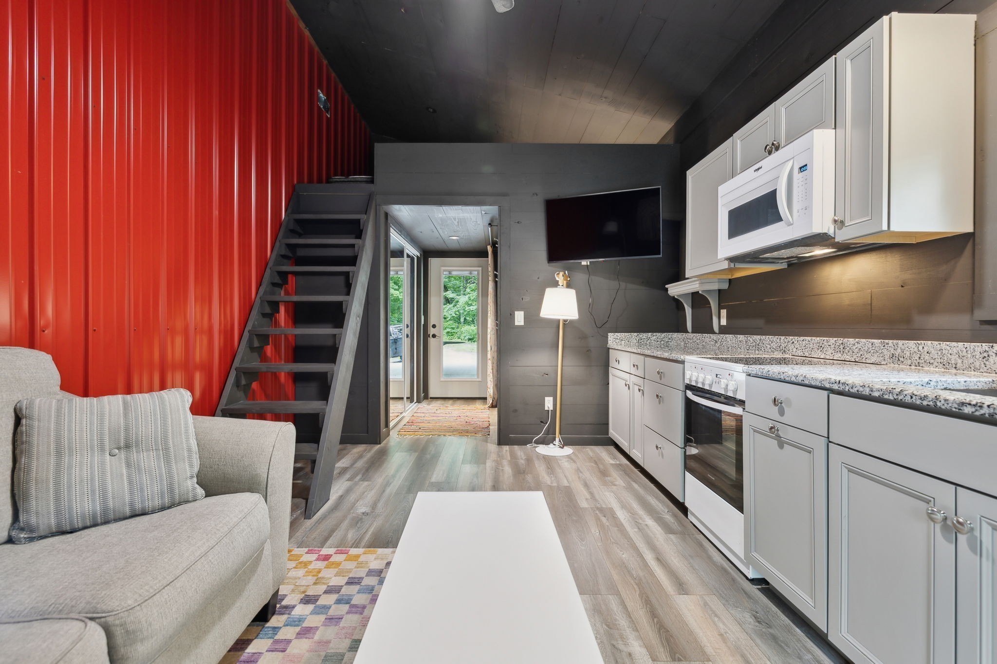 1785 St Johns Road Lascassas, TN 37085 - Photo 37 of 46 a kitchen with stainless steel appliances granite countertop a stove a sink and a microwave