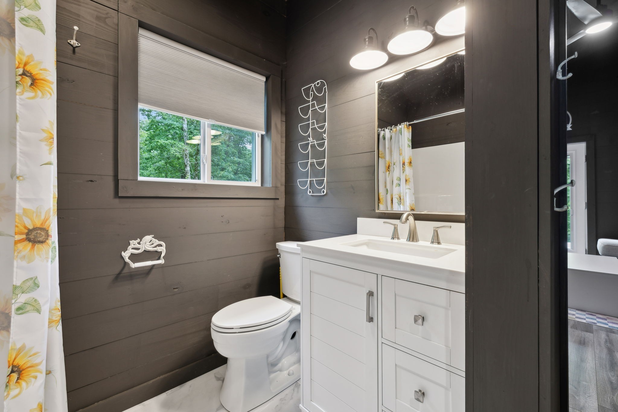 1785 St Johns Road Lascassas, TN 37085 - Photo 40 of 46 a bathroom with a toilet a sink a vanity and mirror