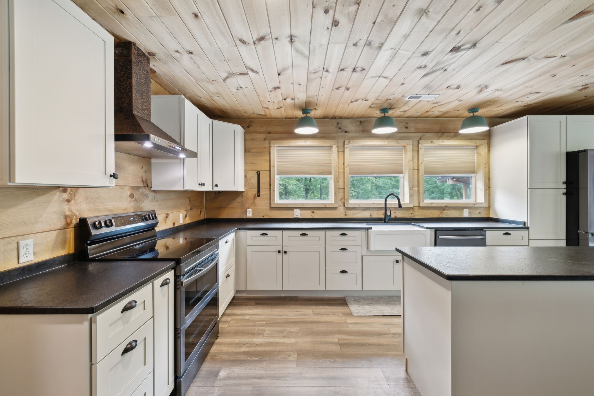 1785 St Johns Road Lascassas, TN 37085 - Photo 5 of 46 a kitchen with stainless steel appliances granite countertop a sink a stove and a refrigerator