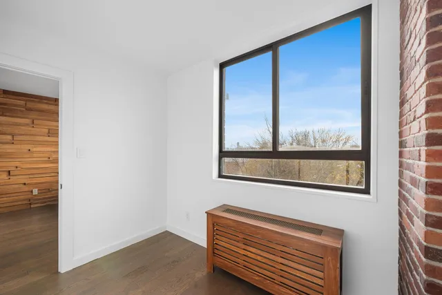 a kitchen with kitchen island a sink stove and refrigerator