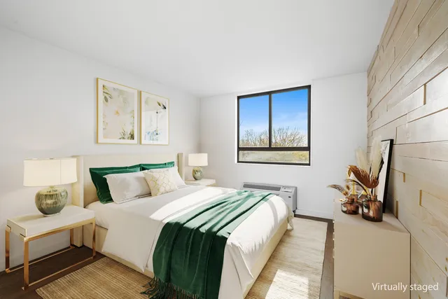 a view of room with hardwood floor and window