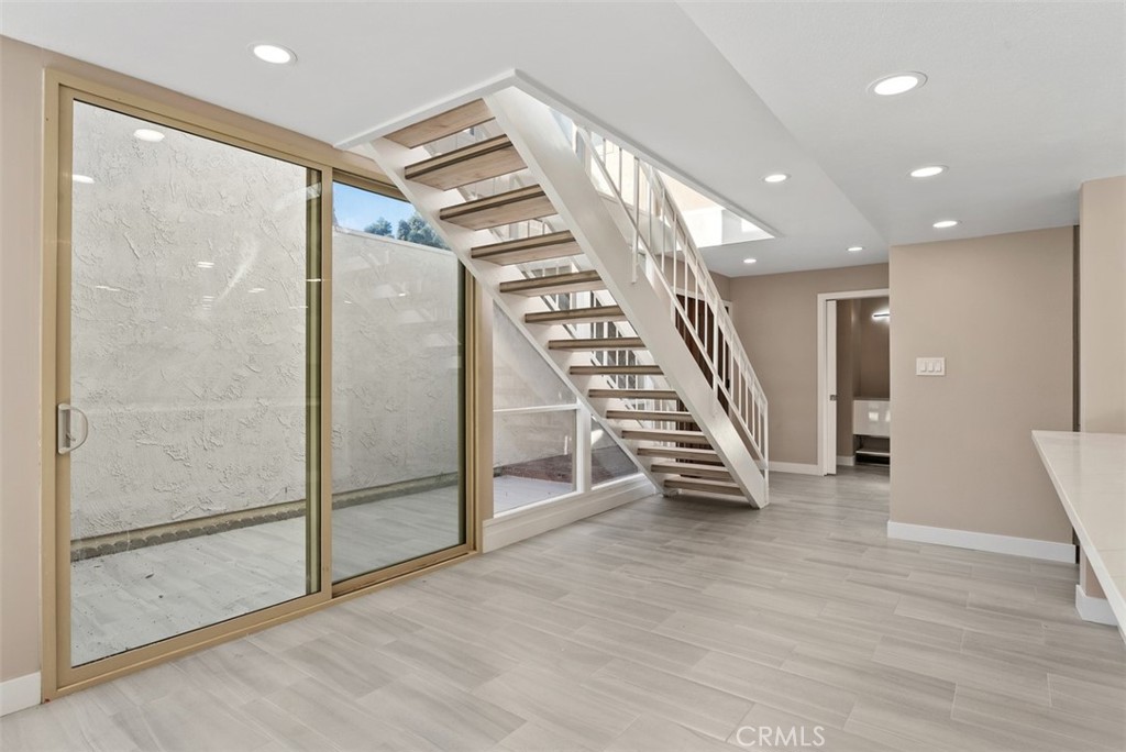 54 Oak Tree Lane Irvine, CA 92612 - Photo 16 of 40 a view of entryway with wooden floor