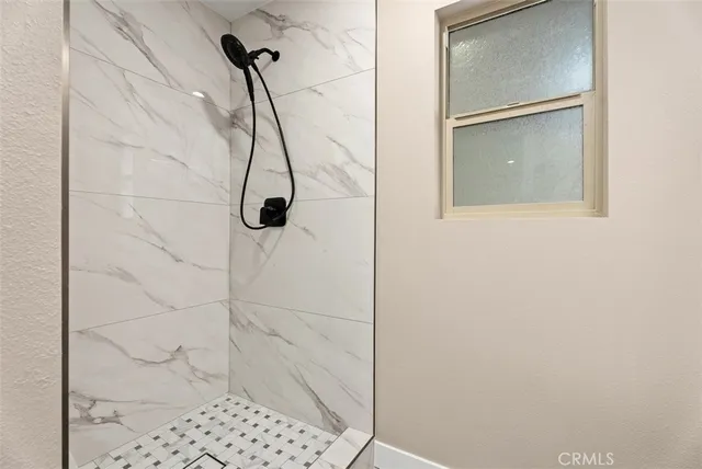 a bathroom with a toilet sink and vanity