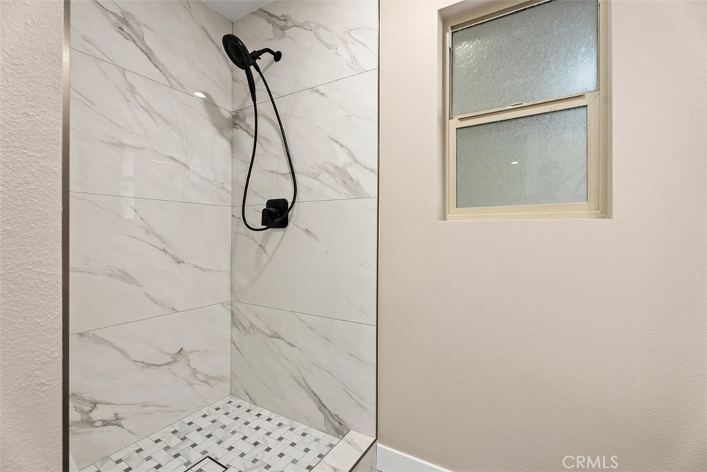 54 Oak Tree Lane Irvine, CA 92612 - Photo 20 of 40 a bathroom with a shower