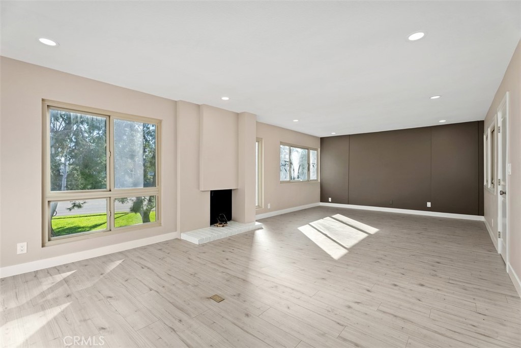 54 Oak Tree Lane Irvine, CA 92612 - Photo 31 of 40 a view of an empty room with a window and front door