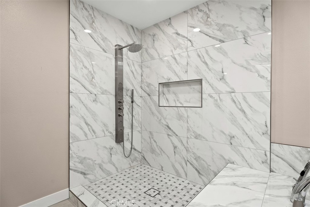 54 Oak Tree Lane Irvine, CA 92612 - Photo 35 of 40 a bathroom with a shower