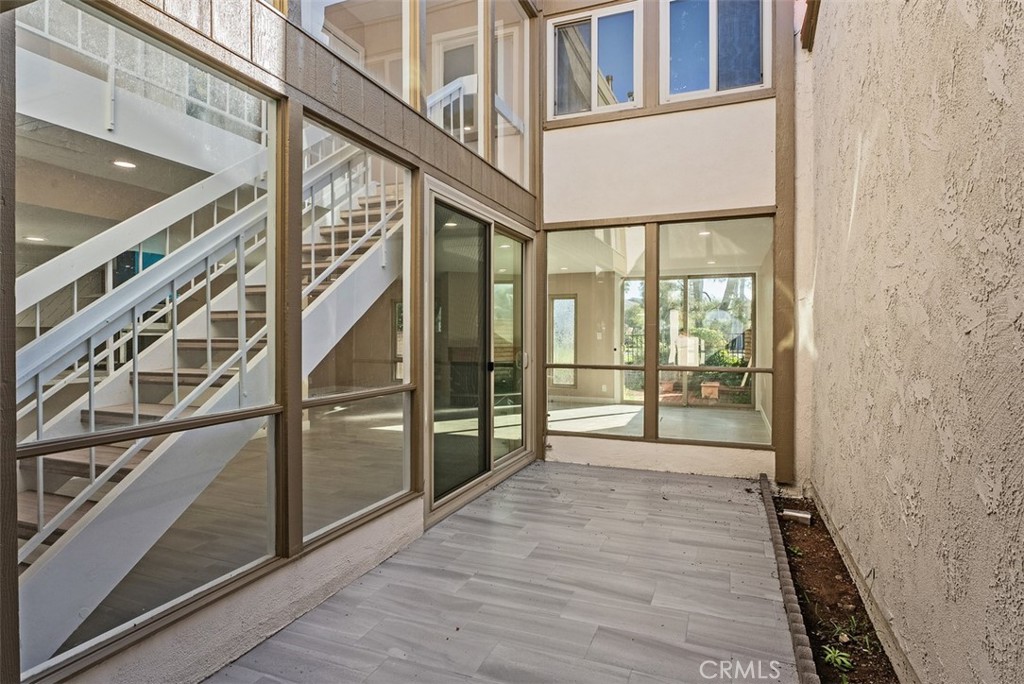 54 Oak Tree Lane Irvine, CA 92612 - Photo 6 of 40 a view of an entryway