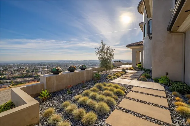 a large kitchen with a table and chairs