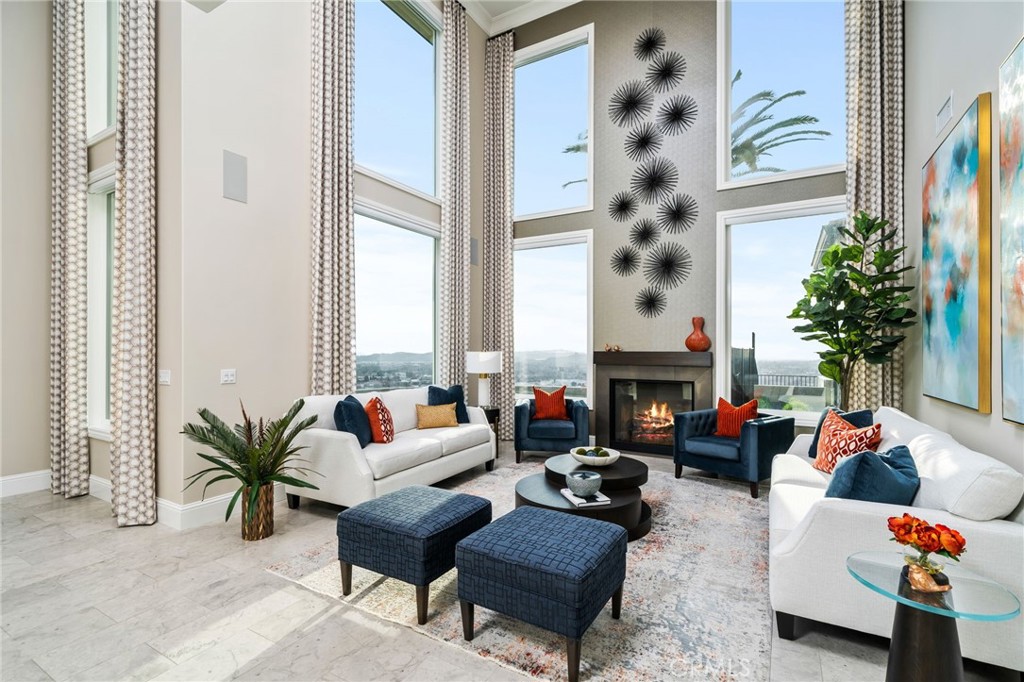 4485 Broken Spur Road La Verne, CA 91750 - Photo 14 of 75 a living room with furniture fireplace and potted plants