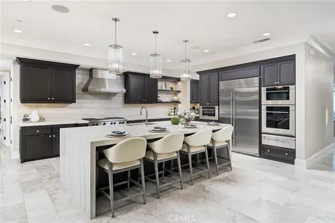 a bed room with a bed and a view of en suite bathroom
