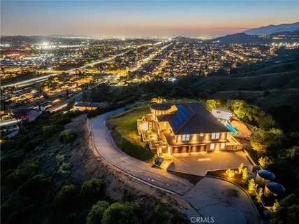 a view of a house with a big yard