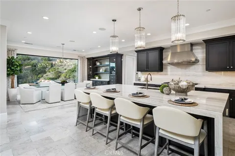 a balcony with furniture and city view
