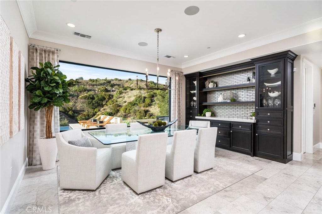 4485 Broken Spur Road La Verne, CA 91750 - Photo 24 of 75 a living room with furniture a flat screen tv and a large window