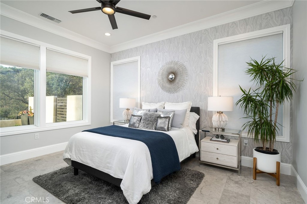 4485 Broken Spur Road La Verne, CA 91750 - Photo 27 of 75 a bedroom with a large bed and a large window