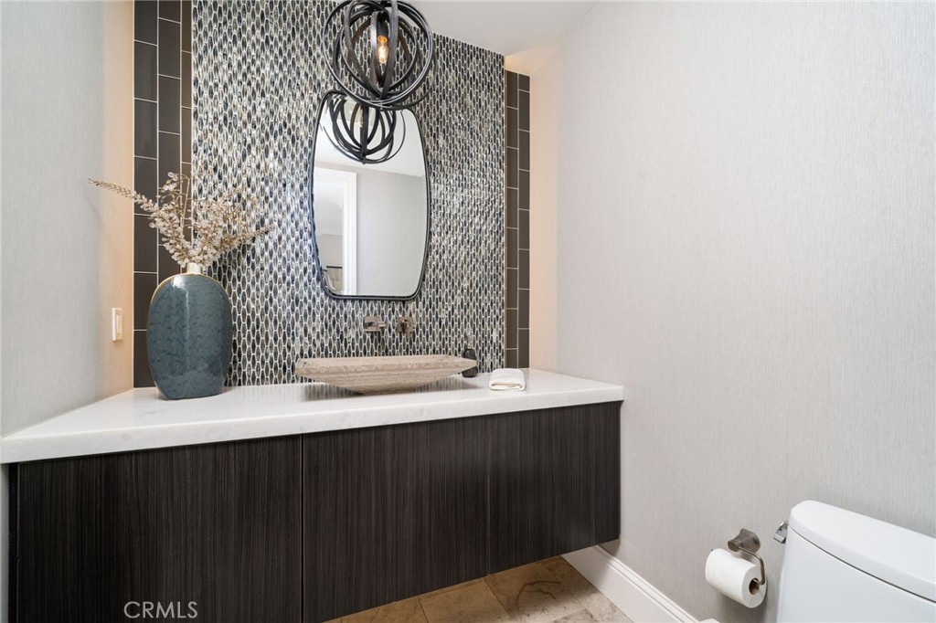 4485 Broken Spur Road La Verne, CA 91750 - Photo 29 of 75 a bathroom with a sink and a mirror