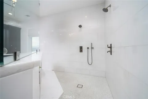 a view of a house with pool table and chairs next to a yard
