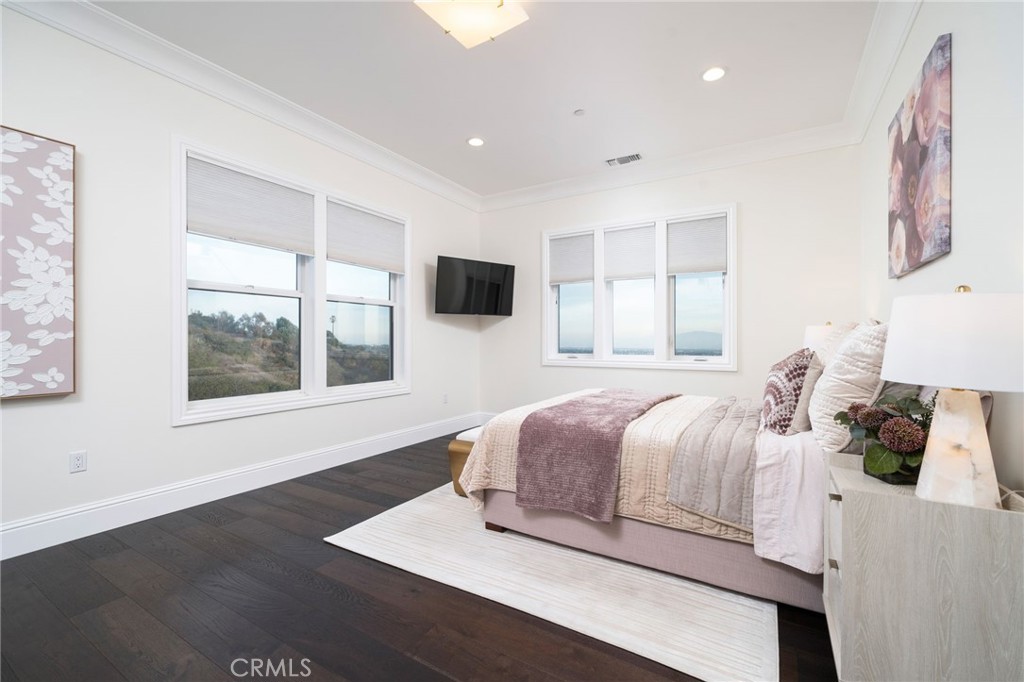 4485 Broken Spur Road La Verne, CA 91750 - Photo 44 of 75 a bedroom with a large bed and a window