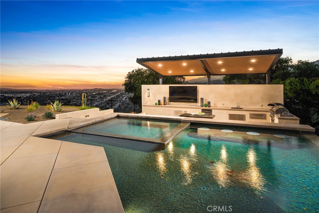 4485 Broken Spur Road La Verne, CA 91750 - Photo 5 of 75 a view of a swimming pool with a patio