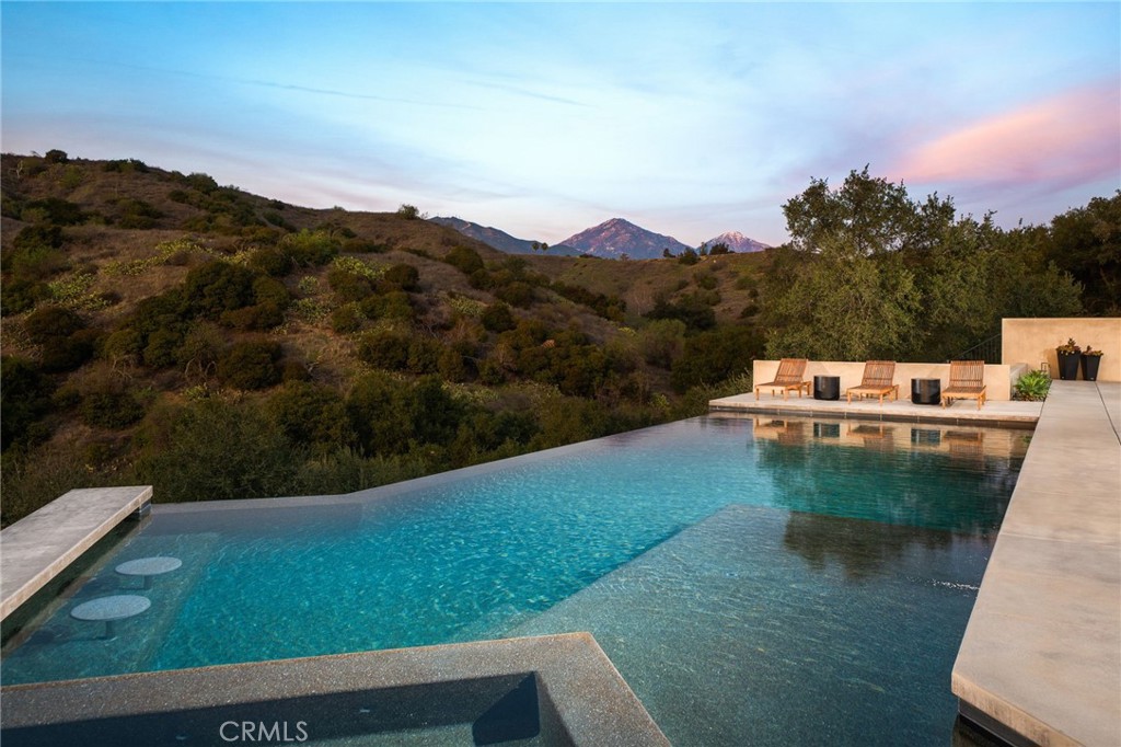 4485 Broken Spur Road La Verne, CA 91750 - Photo 6 of 75 a view of a lake with a mountain in the background