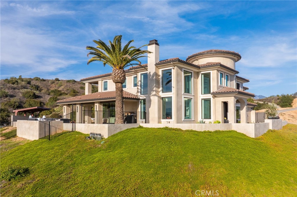 4485 Broken Spur Road La Verne, CA 91750 - Photo 68 of 75 a front view of a house with a garden