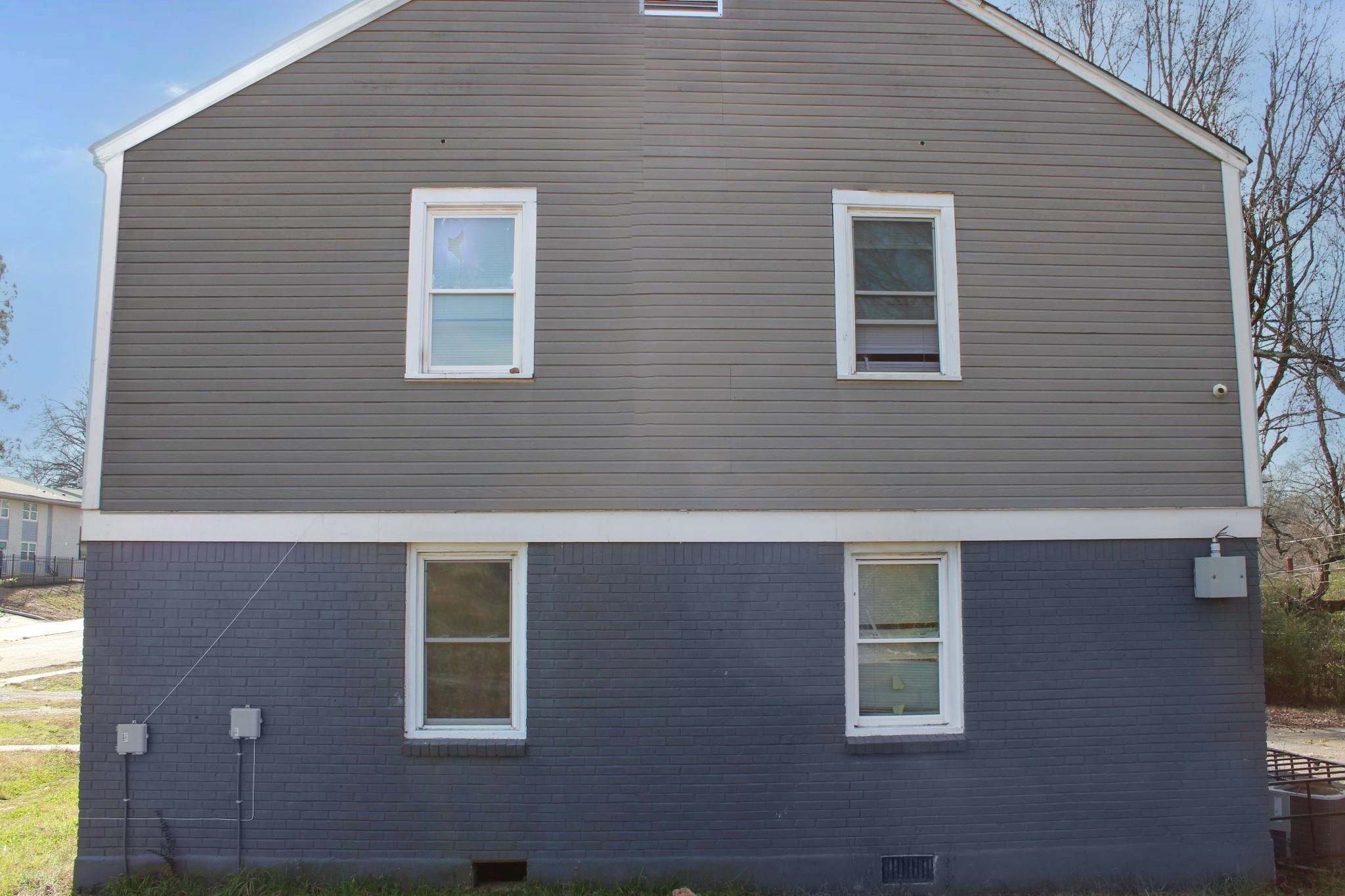 1203 Aubra Road Memphis, TN 38111 - Photo 2 of 10 View of side of home featuring brick siding