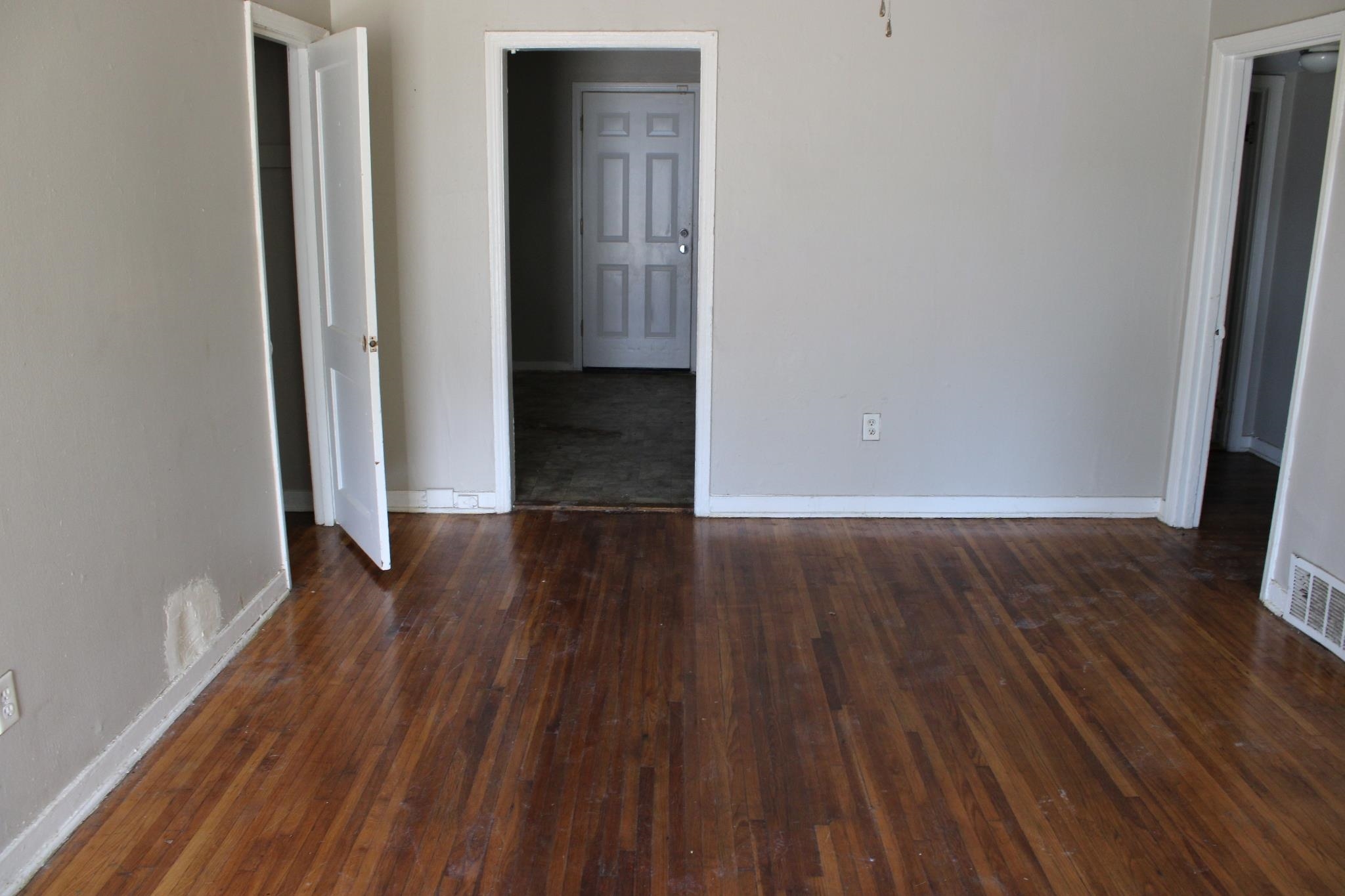 1203 Aubra Road Memphis, TN 38111 - Photo 6 of 10 Spare room with dark wood-type flooring and baseboards