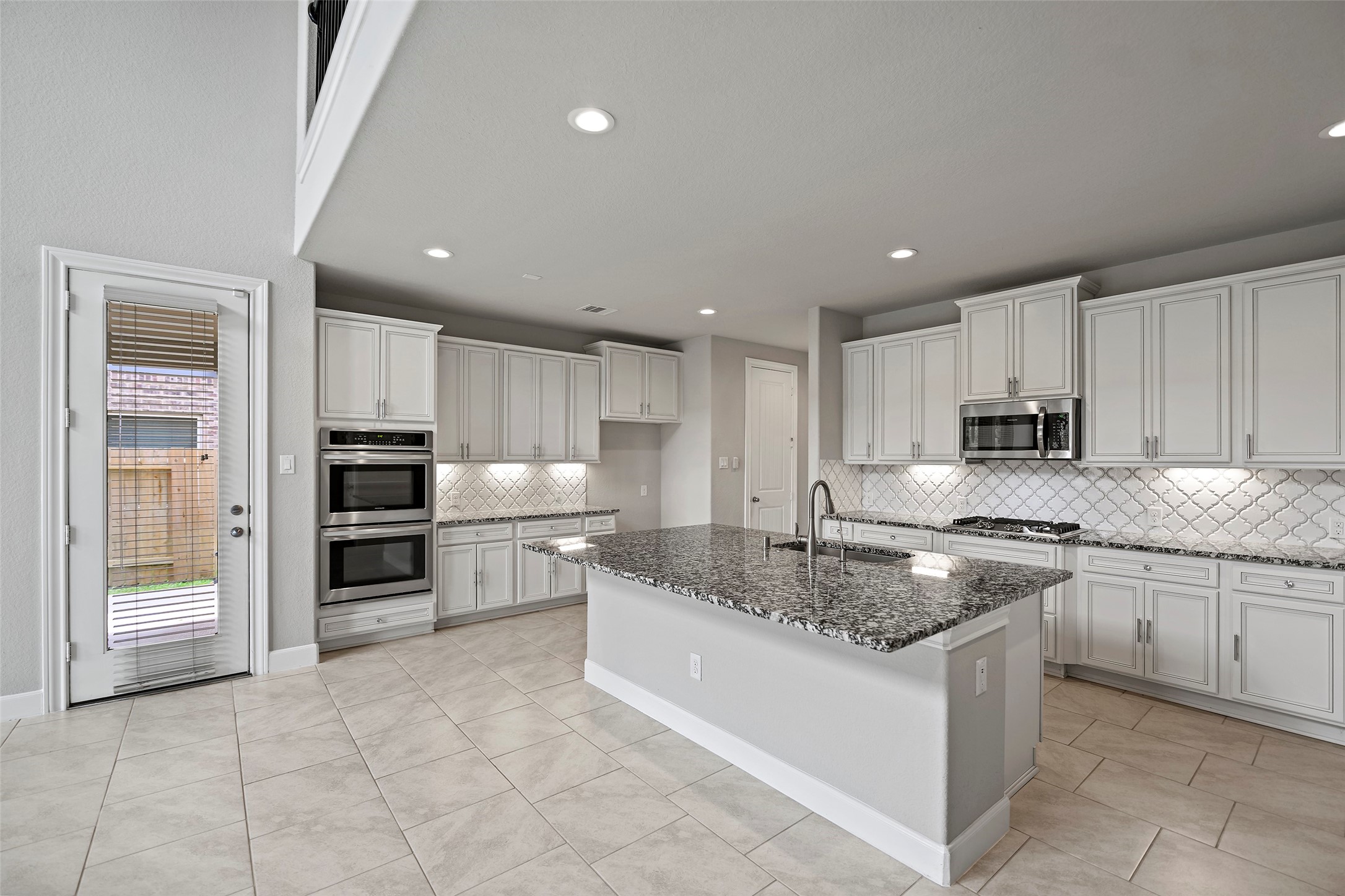 5839 Metaphor Way Rosenberg, TX 77469 - Photo 13 of 50 Chef inspired gourmet kitchen. Perfect for entertaining for large crowd.