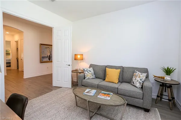 a living room with furniture and a couch