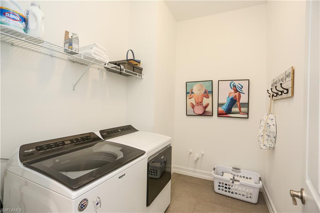 14656 Kelson Circle Naples, FL 34114 - Photo 27 of 50 a utility room with dryer and washer