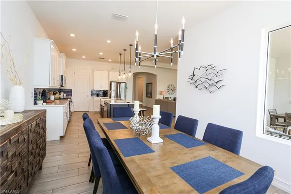 a view of a dining room with furniture