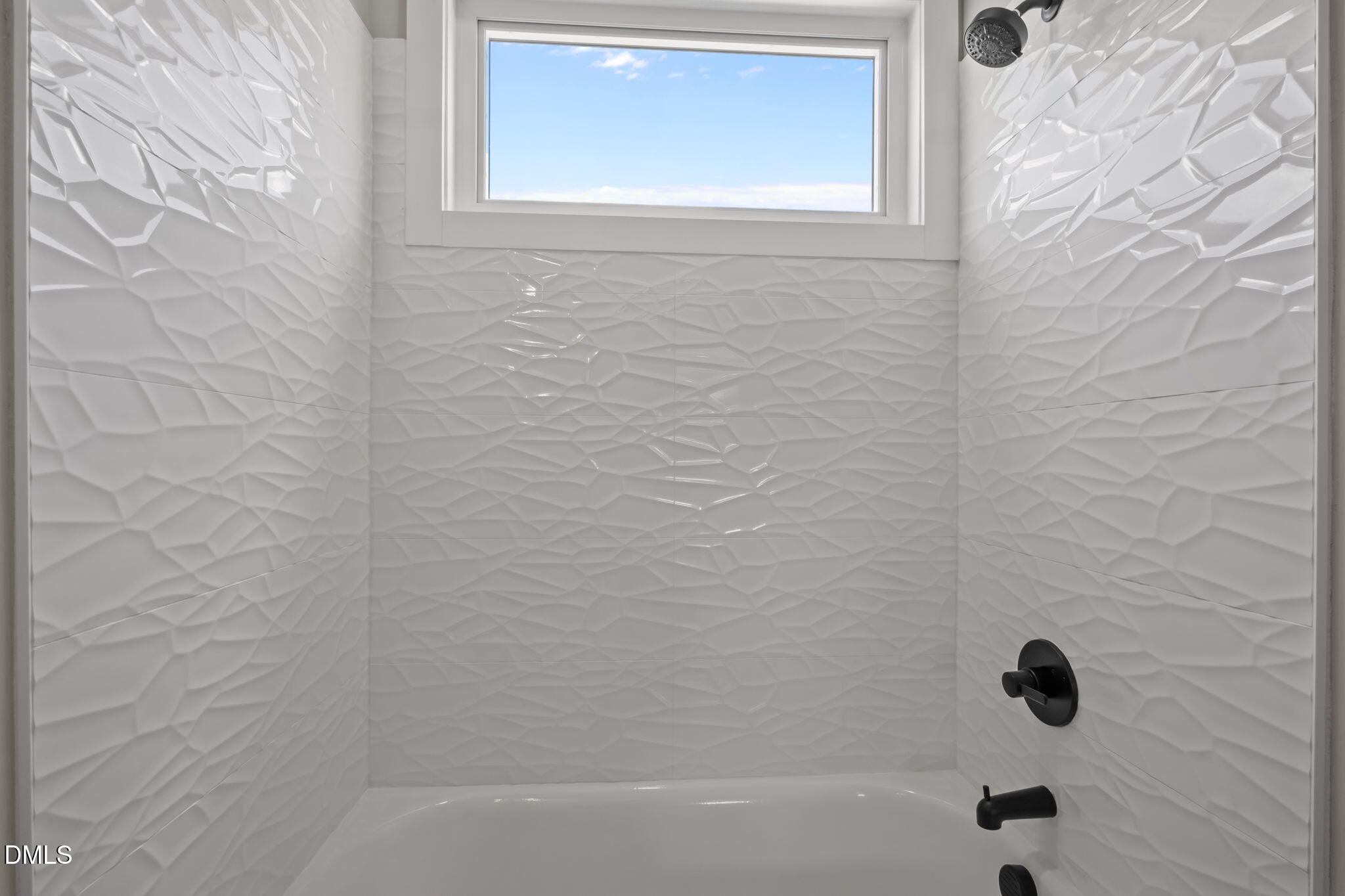 421 Eugene Street, Unit A Durham, NC 27701 - Photo 32 of 38 a bathroom with a bathtub