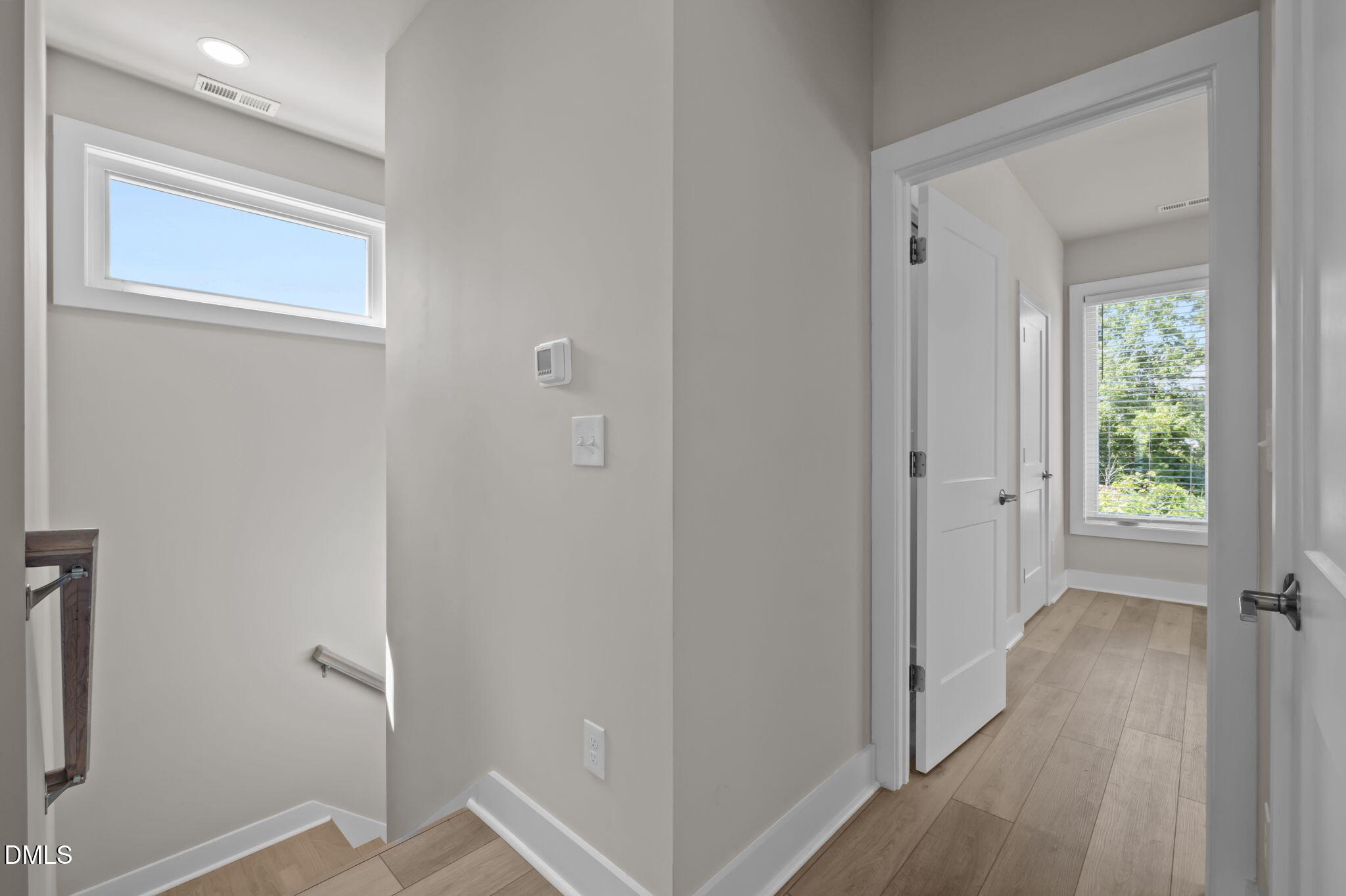 421 Eugene Street, Unit A Durham, NC 27701 - Photo 37 of 38 a view of a hallway with wooden floor